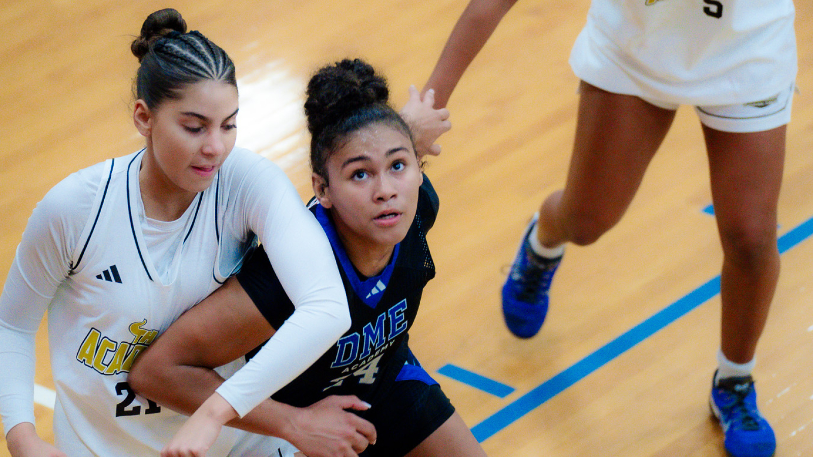 GiGi Battle fights for a rebound against Academy of Central Florida