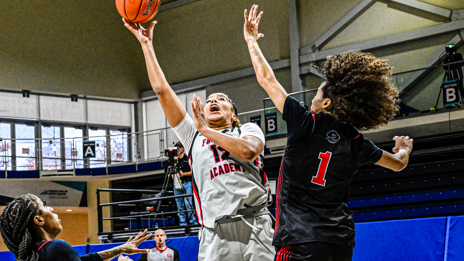 Amelia Sow with the one hand shot for two