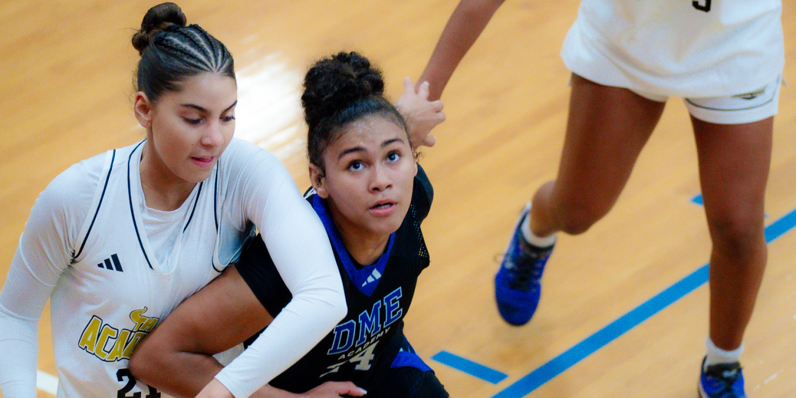 GiGi Battle fights for a rebound against Academy of Central Florida