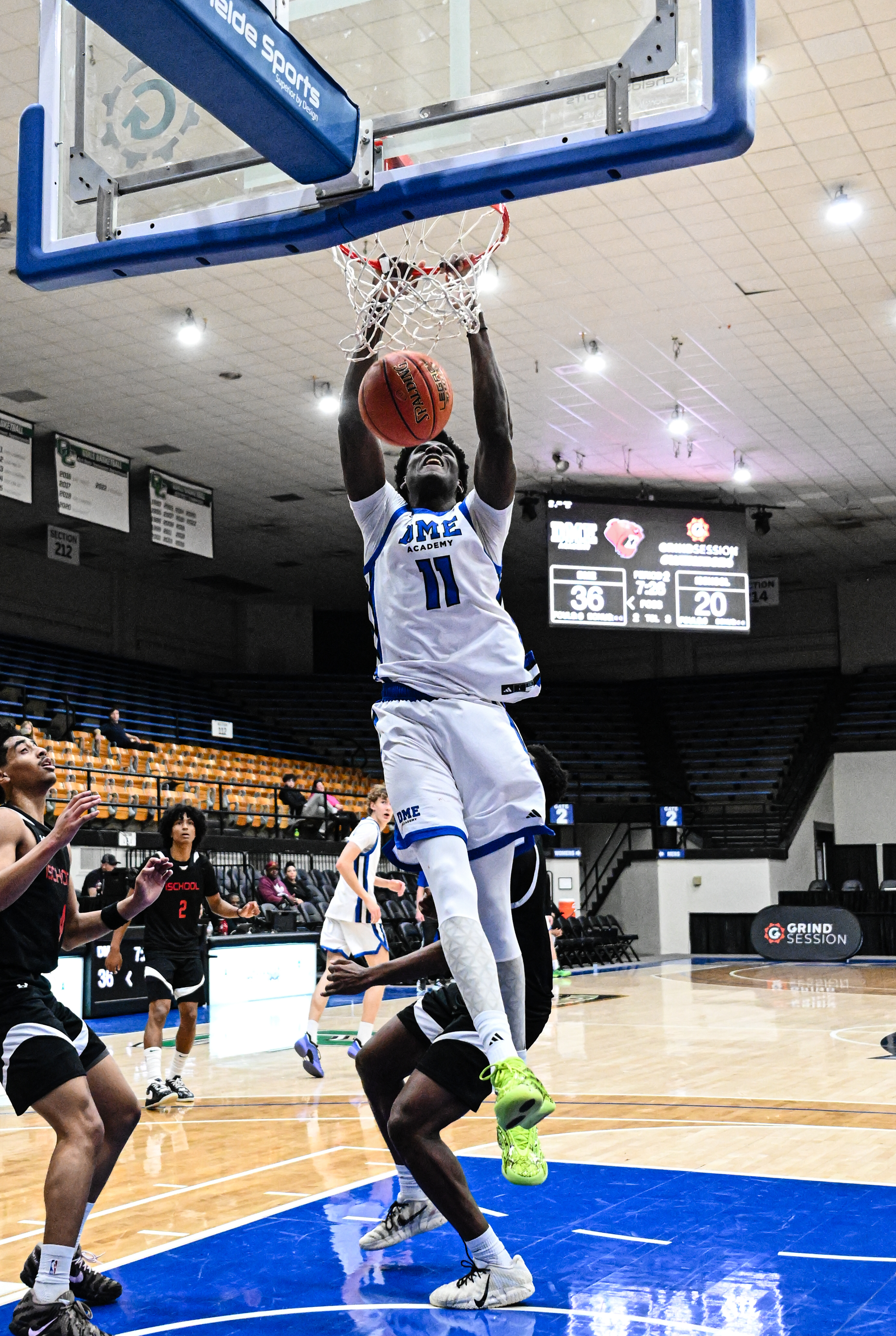 Yohane Kabongo with the fast break dunk for DME