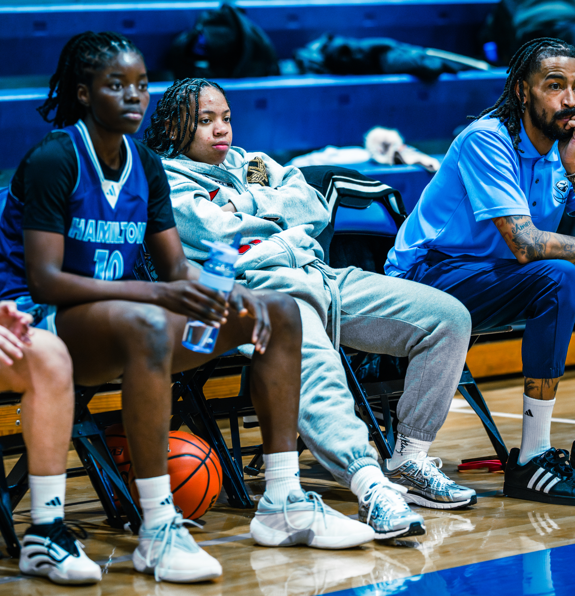 Kamora Moore on the bench during a game