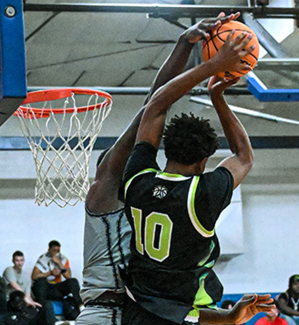 Gillion Academy's Marcus Ponder rejects the shot of Prolific Prep's Draydne McDaniel