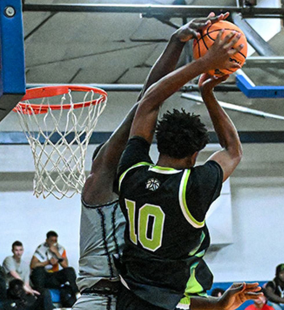 Gillion Academy's Marcus Ponder rejects the shot of Prolific Prep's Draydne McDaniel