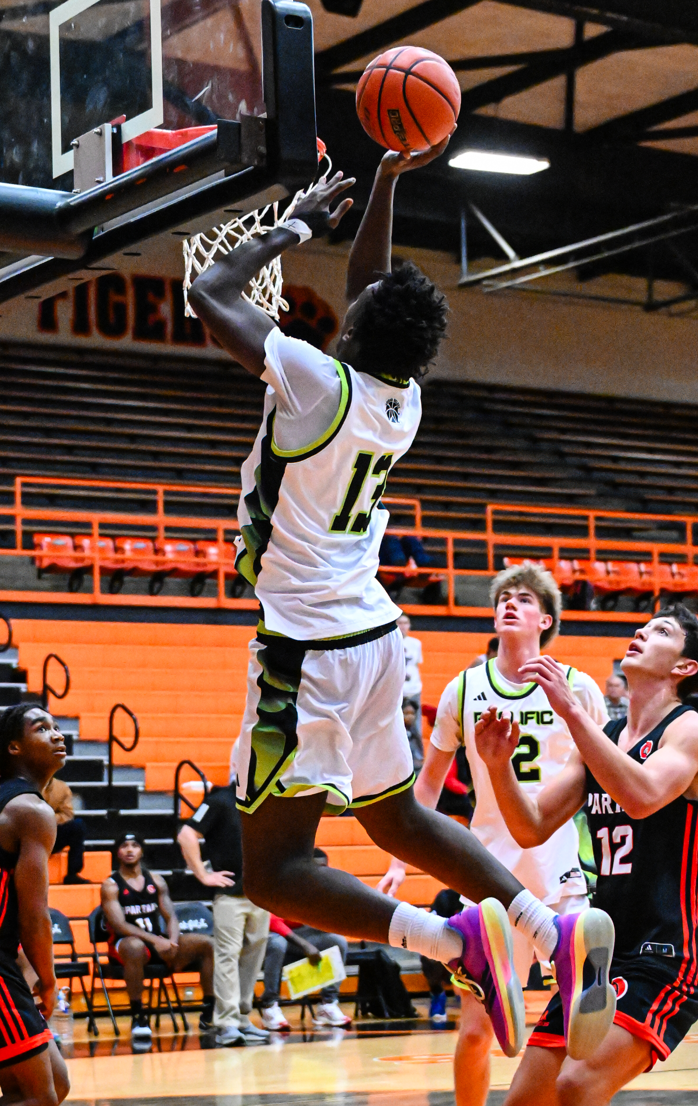 MJ Madison with the one-hand floater for two points