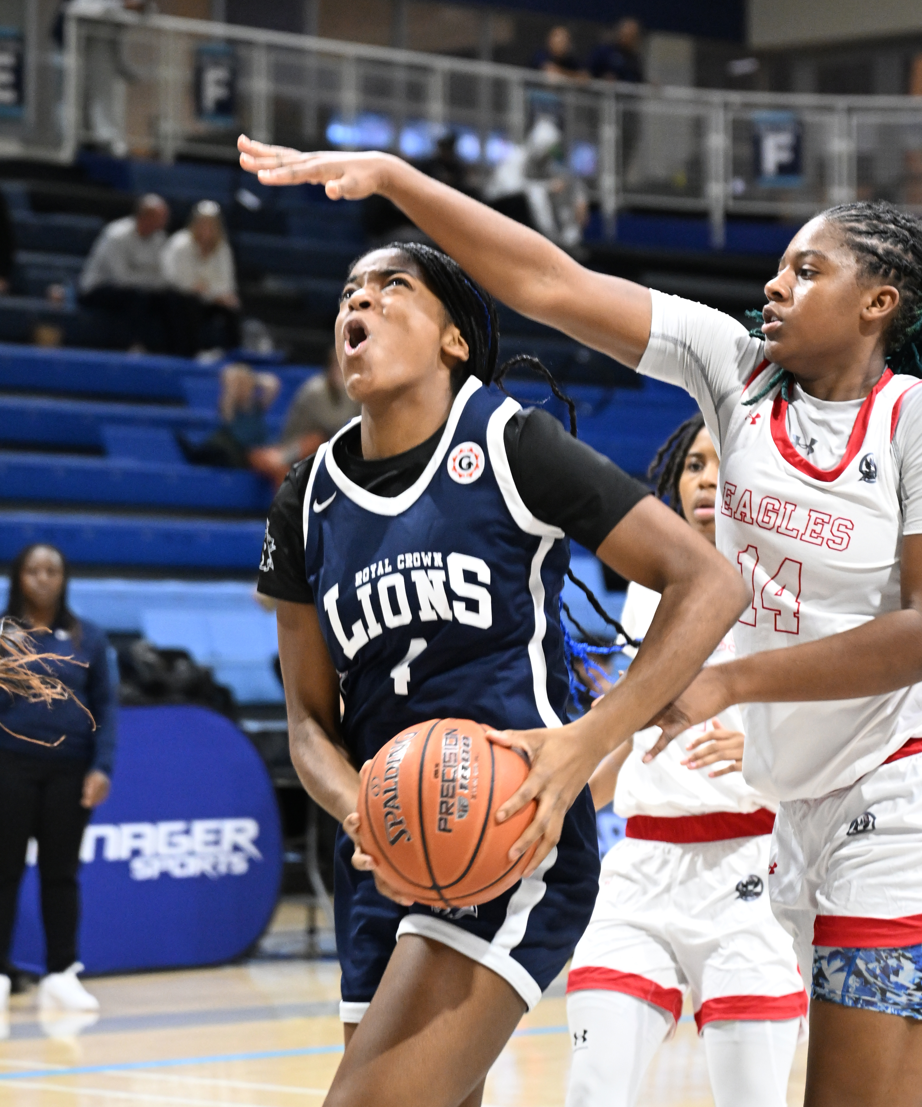 Eunicia Salgado drives hard to the hoop