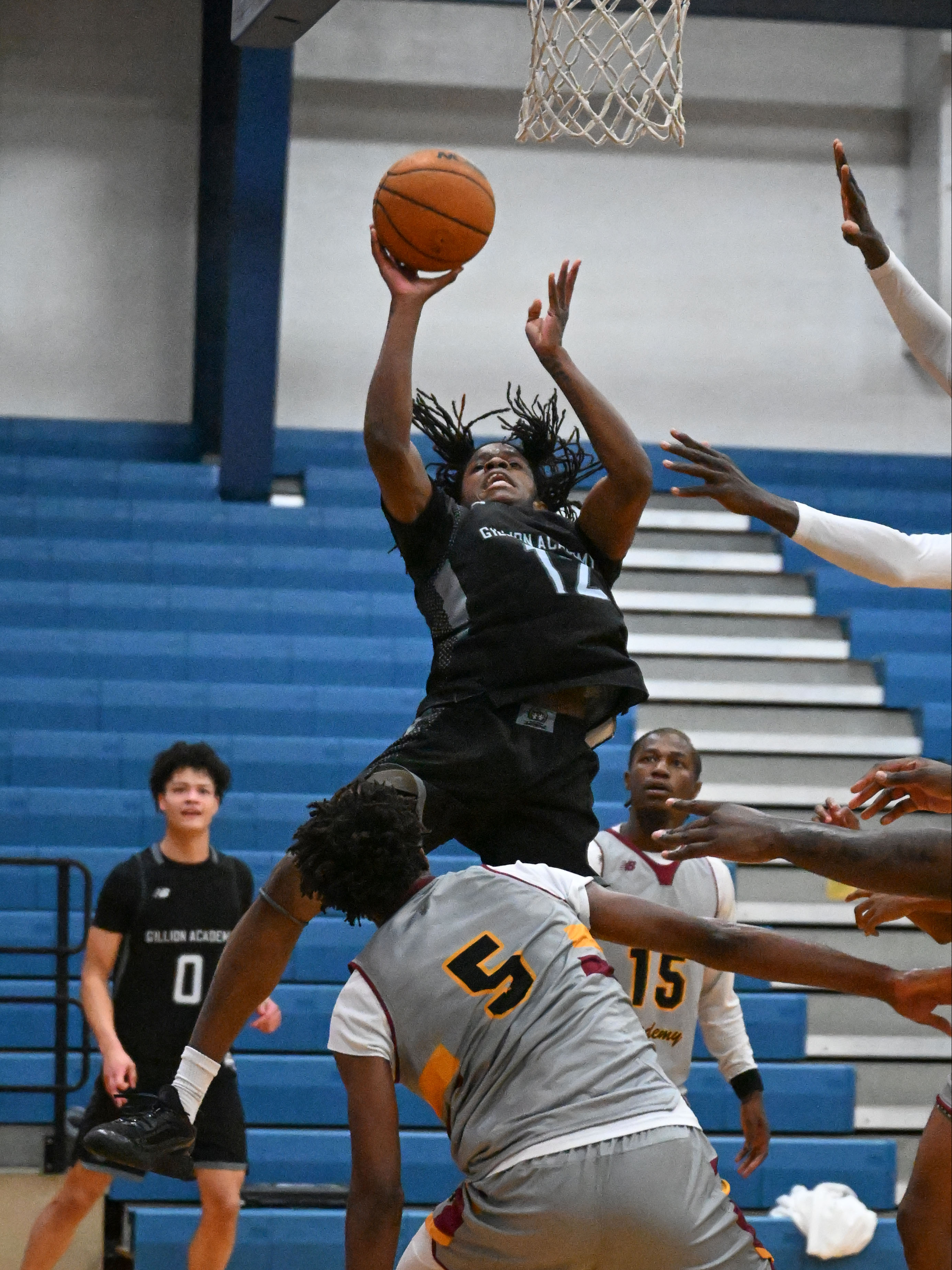 Gillion Academy's Willie Burnett III to the hoop vs West Oaks Academy