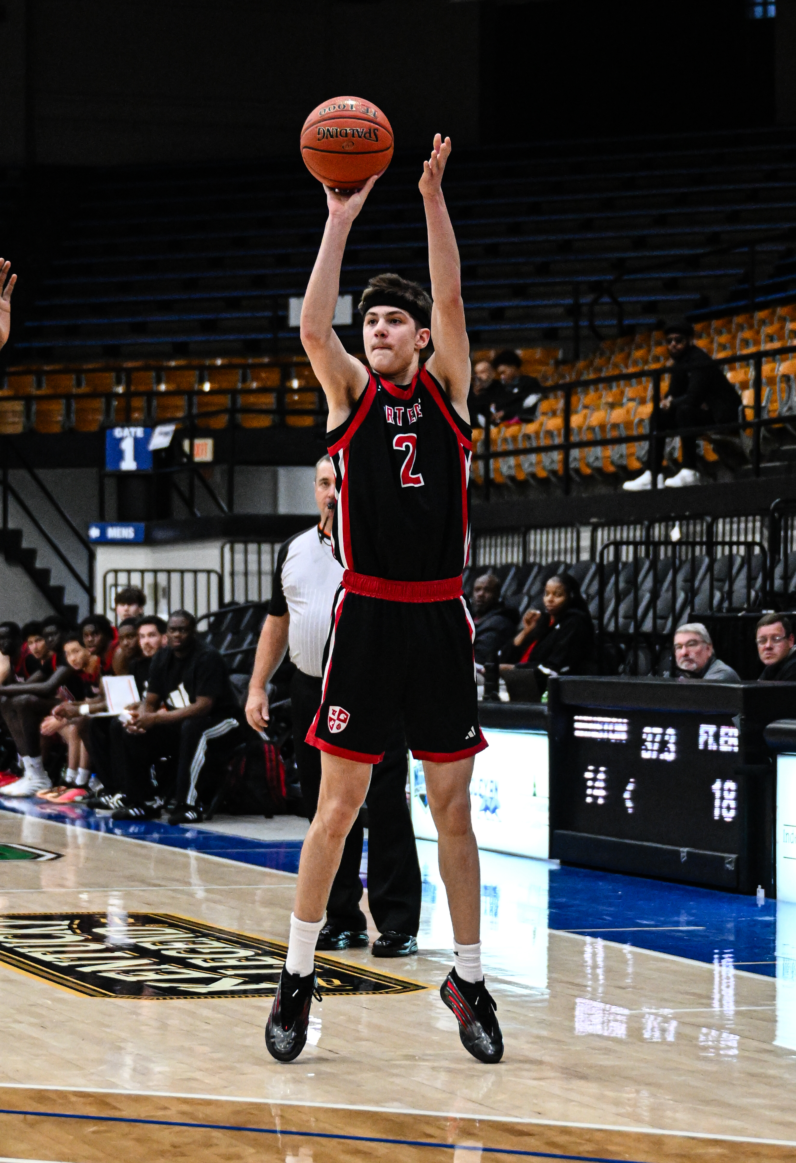 Eli Jolin hits a three point shot for Ft. Erie International