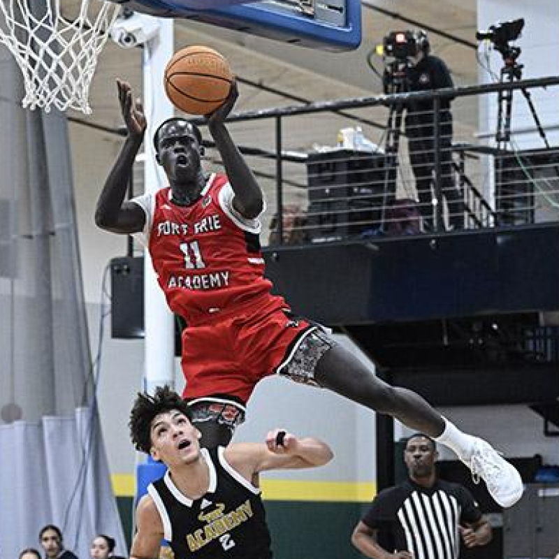Fort Erie's Deng Ngor skys over Central Florida's Niko Albino