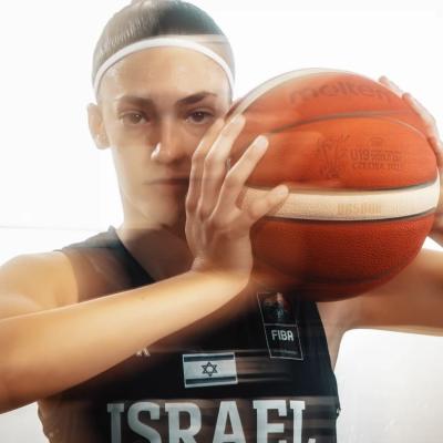 Gal Raviv with basketball in hand