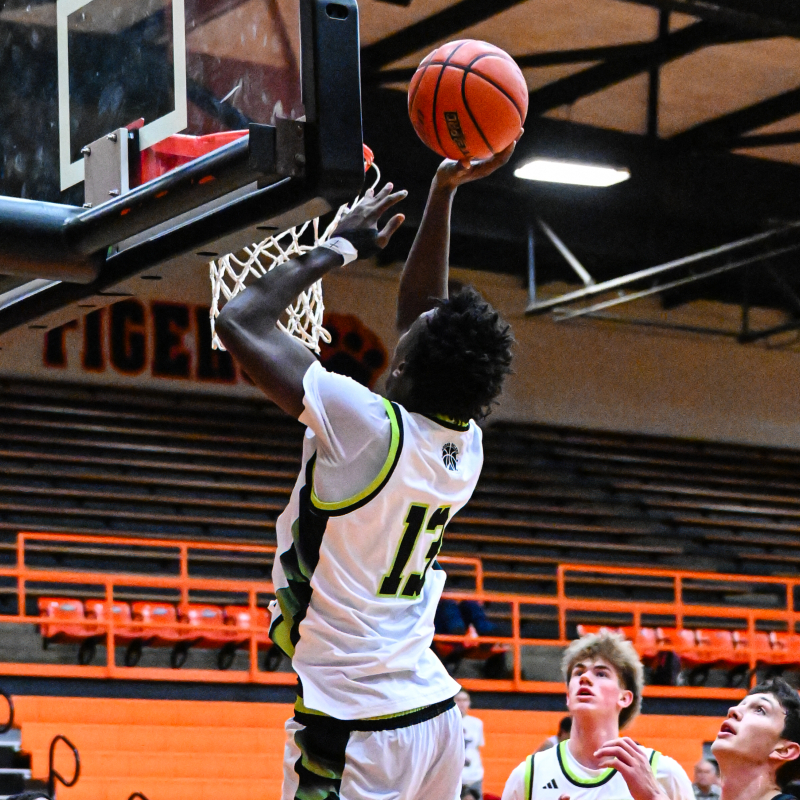 MJ Madison with the one-hand floater for two points