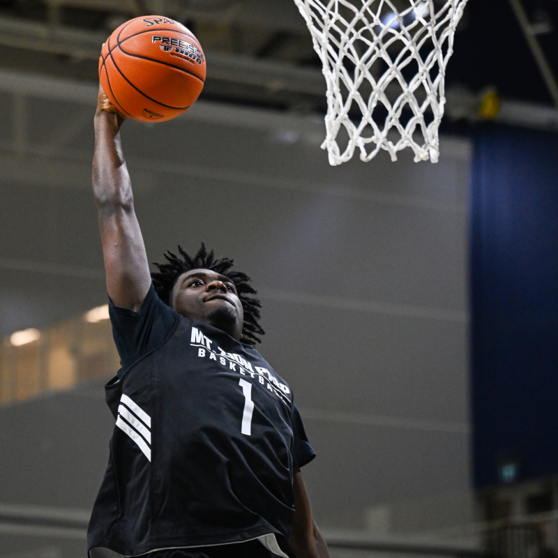 Jacob Canton with the throw down dunk