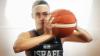 Gal Raviv with basketball in hand